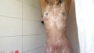 Asian girl takes a sexy shower
